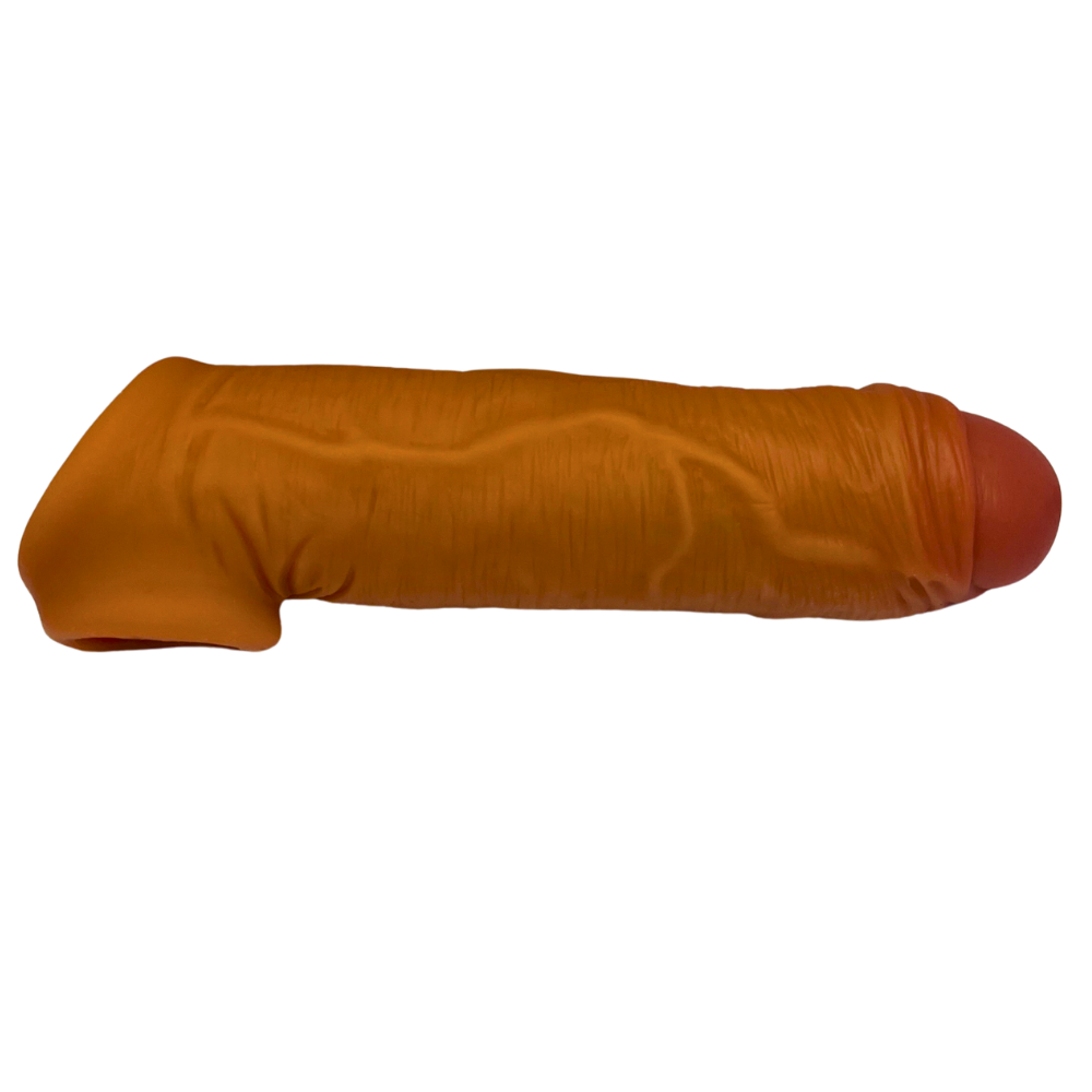 Opposite side view of the Smooth Cock Sleeve, focusing on the integrated ball holder area for a secure fit.