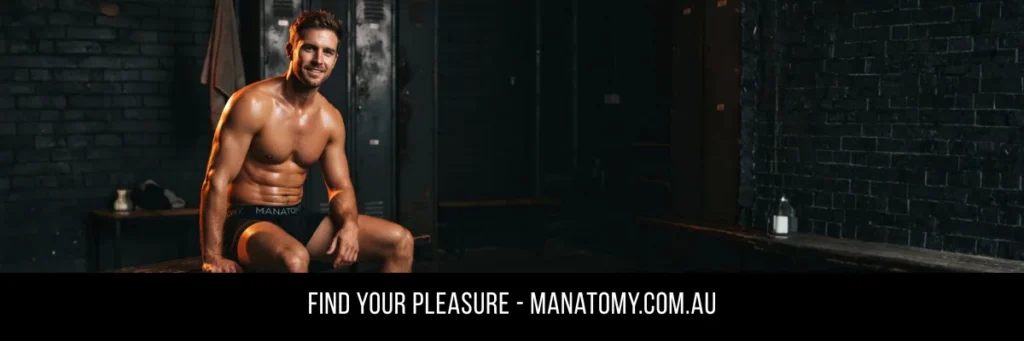A smiling man sitting on a bench against a dark brick wall, above a Find Your Pleasure banner.